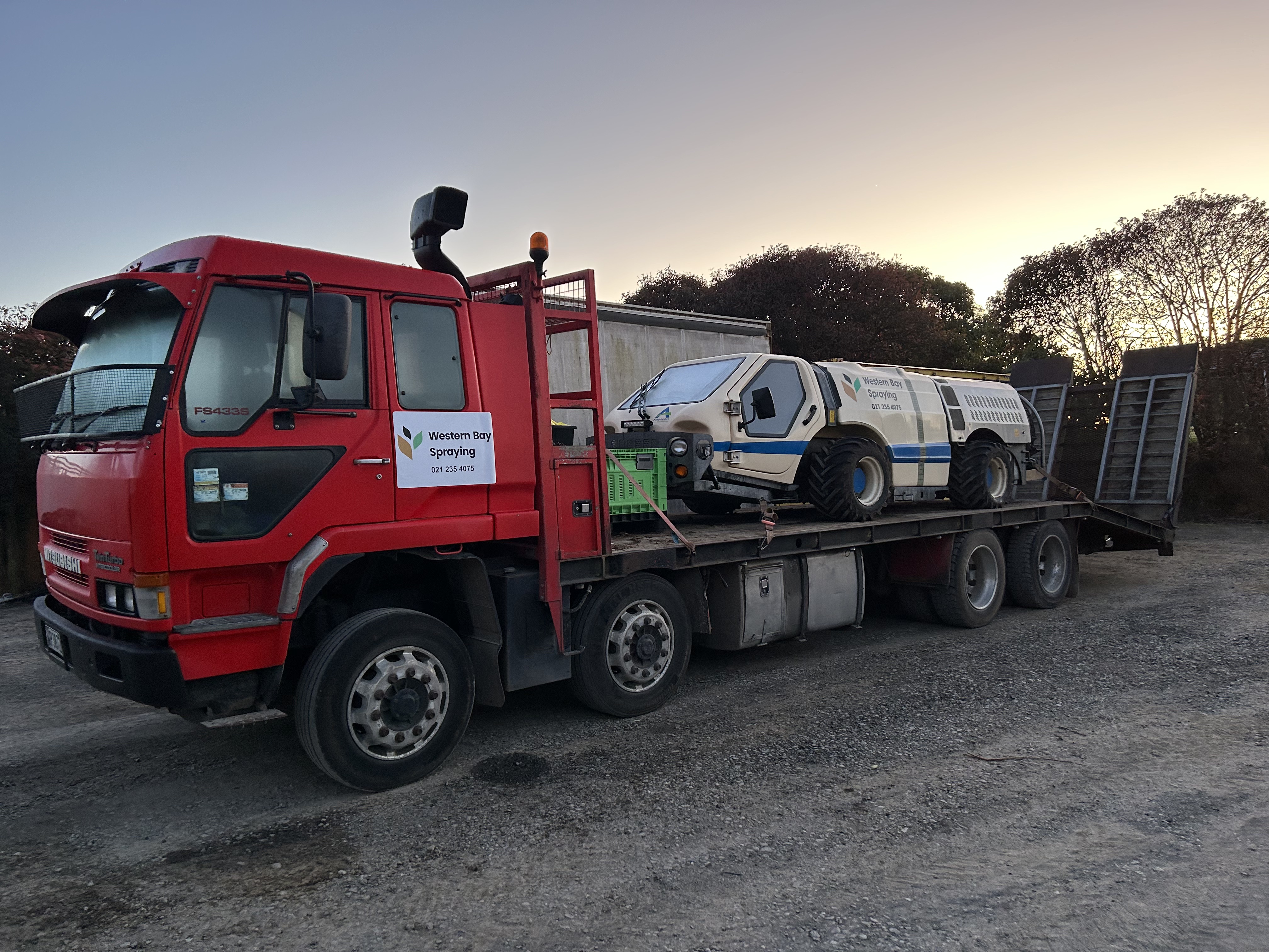 Machine on the move between orchards