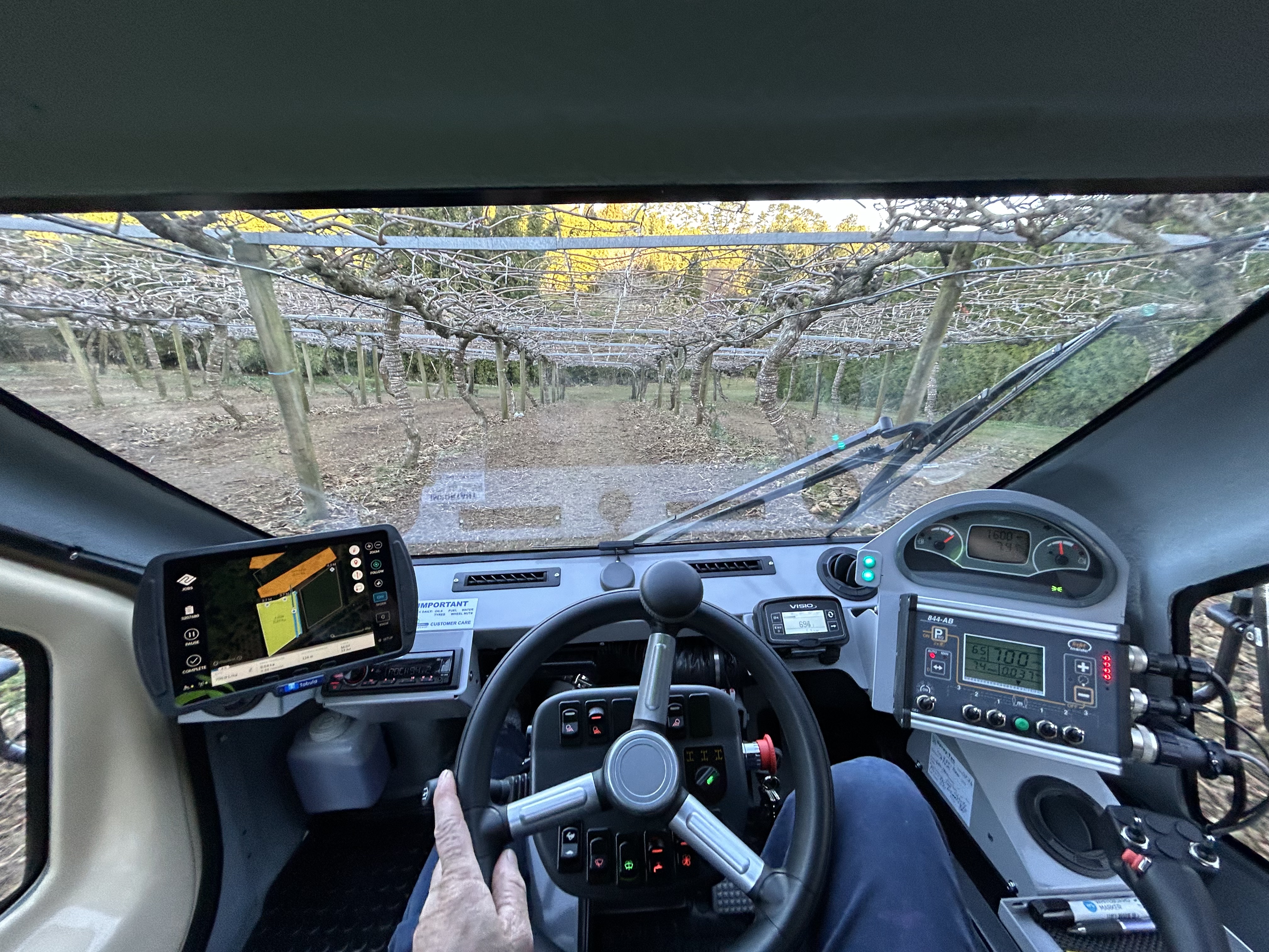 In the cab, Tabula GPS running as the machine works the canopy